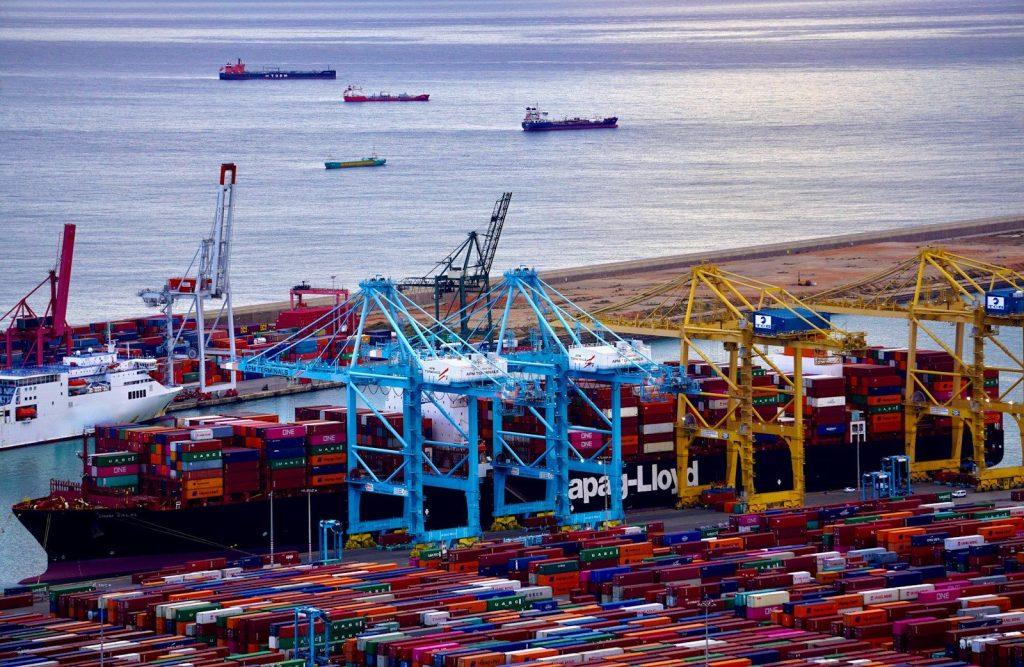 a harbor filled with lots of containers and ships